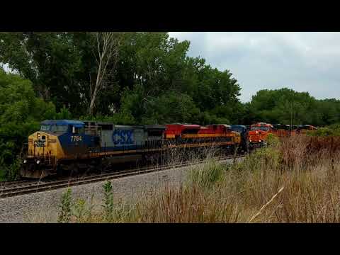 BNSF 6408  meets CSX 7764 and KCS westbound at Ashland,NE