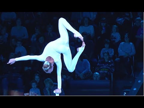 Circus. Equilibrist in white. Super!!!