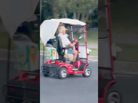 Can’t catch this guy #funny #old #scooter #wheelie #rider #biker