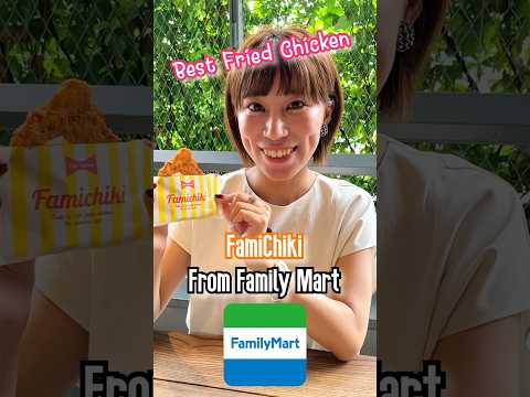 A Japanese girl shares fried chicken, FamiChiki from Japanese Convenience Store, Family Mart