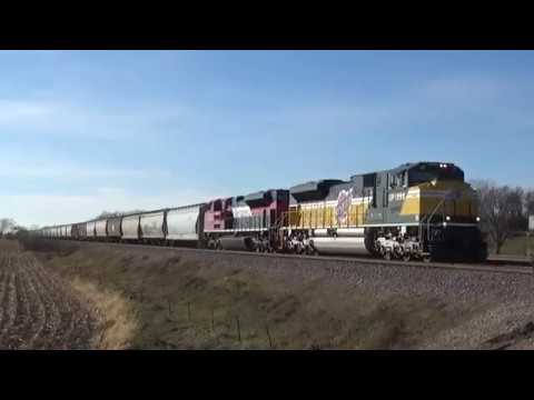 Union Pacific 1995 CNW Heritage unit leads an eastbound grain train near Denison, Iowa