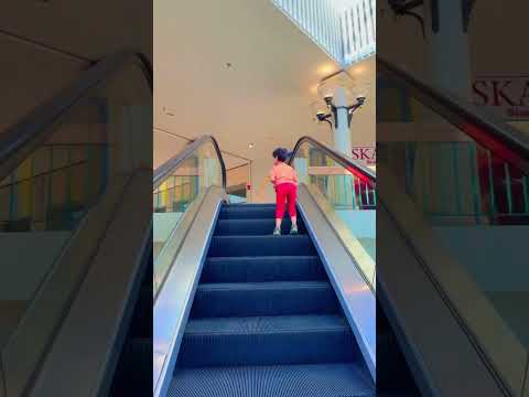 Tiny toddler on an  #escalator by himself🥸🥳🫣