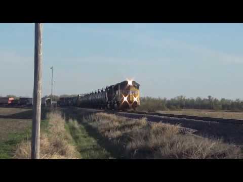 Union Pacific 3791 leads a mixed freight train north onto,  Sioux City Sub