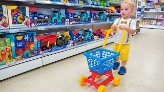 Chris and mom doing shopping in Toy store