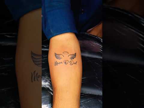 A wings tattoo for missing mom and dad , tattoos by navkar tattoos indore