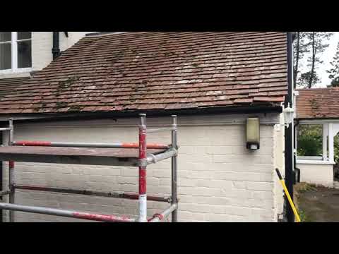 Doff roof cleaning tiles and gravel driveway using the Therma-Tech superheated cleaning system