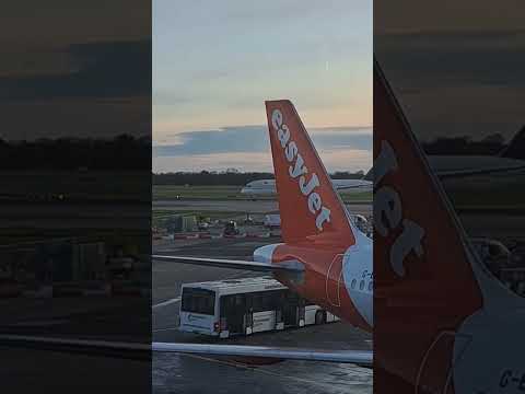 Manchester Airport T1 Apron. Saudi Dreamliner Boeing 787. easyJet Airbus A320 x 2 on stand.