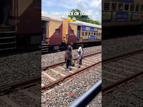 😳Family stuck between trains 😰 #youtubeshorts #shorts #travel #accident #crossingtrains #india2024