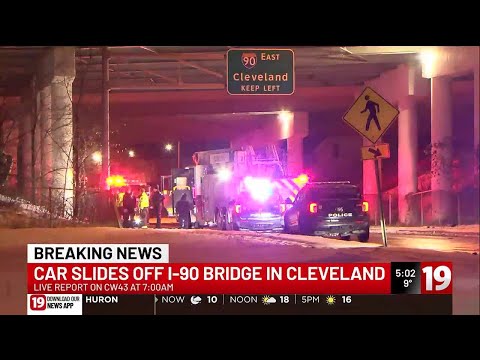 Car slides off I-90 bridge