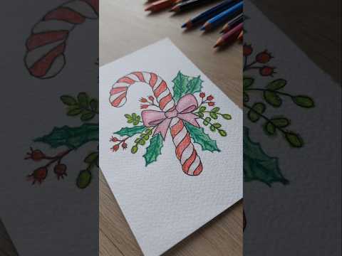 Here's a little candy cane and holly design sketched with watercolor pencil #candycane #newyear2025