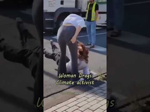 Protester Dragged By Her Hair From The Road By Angry Woman