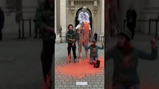 Climate activists deface art in Paris and Milan