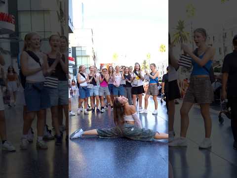 A group of tourists got a full dance performance on Hollywood.