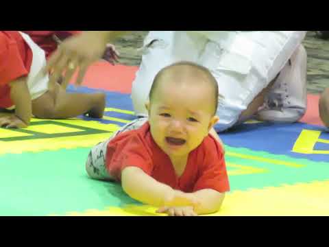 FUNNY BABY CRAWLING RACE. HONOLULU HAWAII USA