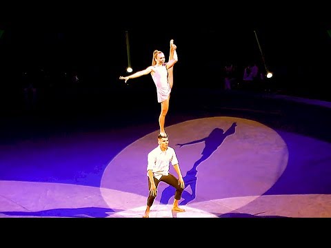 Circus. Girl and guy. Acrobats. Bravo !!!