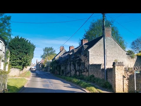 Driving in Bletchington village, Oxfordshire.