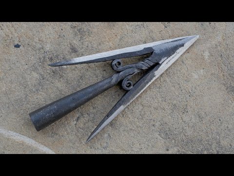 Forging decorated medieval arrowhead. Blacksmithing