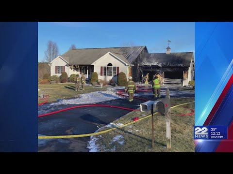 Multiple crews put out garage fire in Ludlow, one left without a home