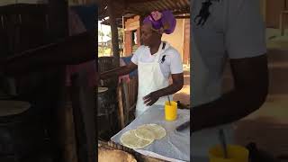 Enterprising and beautiful woman, running A small roadside food business