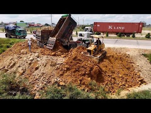 Nice Skill Operator At New Project Mitsubishi BD2F Dozer Pushing Soil, Dump Truck Unloading