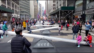 In NYC there are Seesaws in the middle of Broadway!!