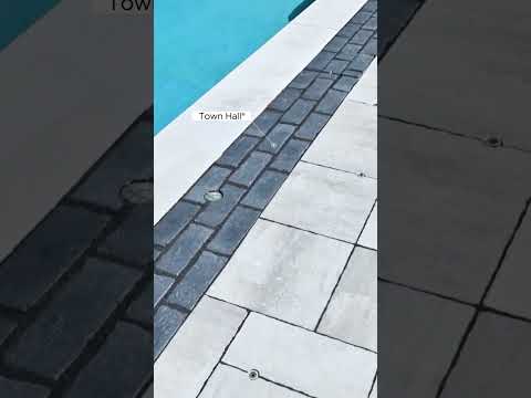 Pool Deck Design with Curved Edges and Natural Rock Gardens