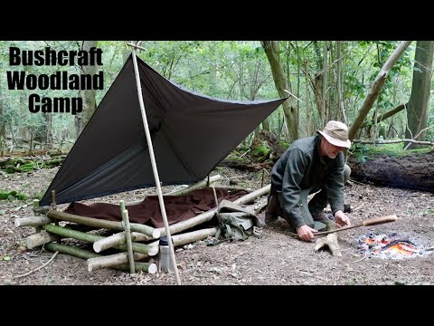 Solo Woodland Bushcraft Camp with Minimal Gear. Poncho Shelter and Raised Bed. Caveman Steak