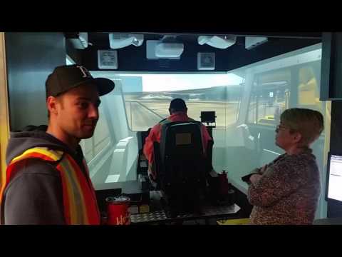 Student driving the rock truck Simulator