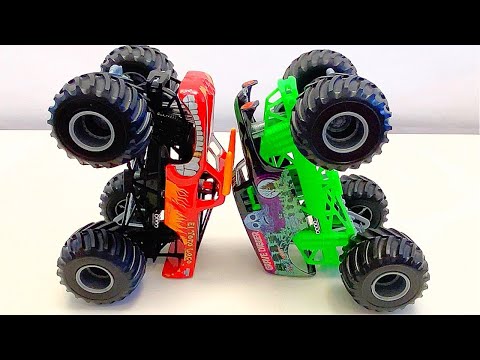 MONSTER JAM | GRAVE DIGGER vs EL TORO LOCO | SPIN MASTER | HEAD TO HEAD | HOT WHEELS MONSTER TRUCKS