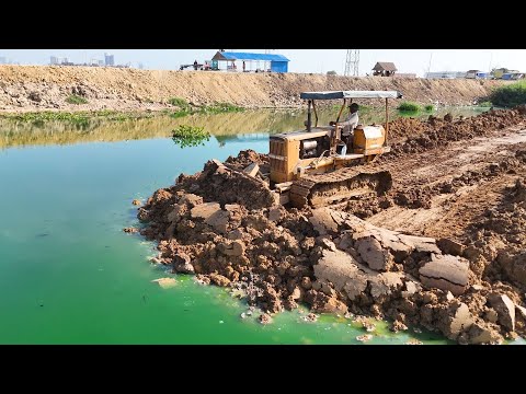 Continue The Wonderful Action Building Land Dike Around Water, Komatsu D31A Dozer Pushing Dirt Level