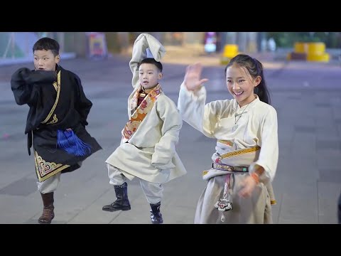 Tibetan dance by the lovely Tibetan brothers and sisters is so wonderful