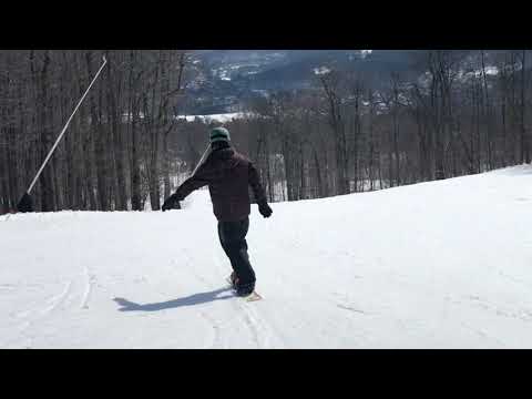 Erik's first time on an alpine snowboard