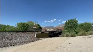 BNSF locomotives pulling Oil  tankers! Sounds like knifes being sharpened around this curve!