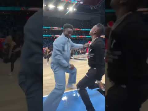 Boosie and Desi Banks hitting the Swag Surf at the Atlanta Hawks game.