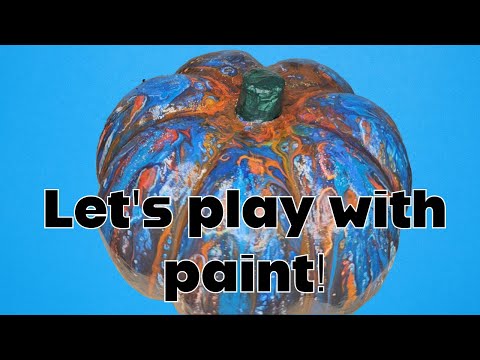 Using the paint pour method to decorate a pumpkin 🎃🎨 #paintpouring #crafts #easycraftideas