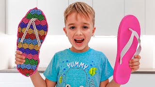 Vlad and Niki are learning to play with magnet balls