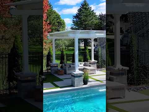 Geometric Paver Pool Deck Design with Lines of Artificial Turf