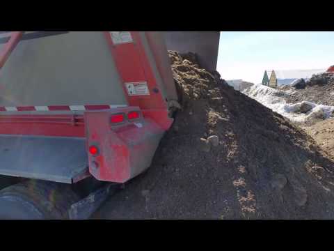 Rene Ladouceur unloading the belt trailer