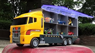 12 Hot Wheels cars & Big orange truck.