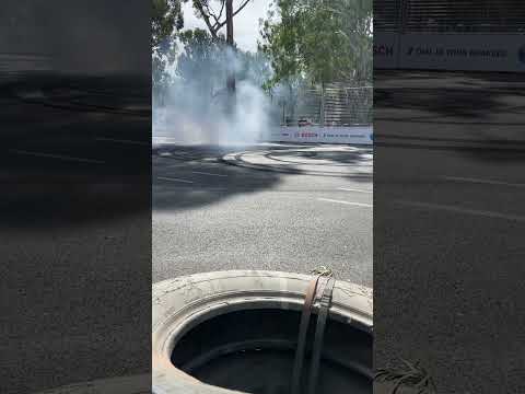 Hayden Paddon doing donuts in HYUNDAI KONA EV rally car at the 2023 Adelaide Motorsport Festival.