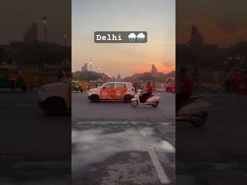 Delhi rain ☔️ 🏳️‍🌈 #delhirain #rainbow #viralexplore #explorepage #tradingsongs #tradingvideo