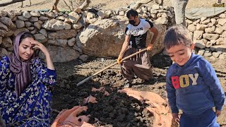 Nomadic life in Iran: the mountain man repairs the place of the sheep