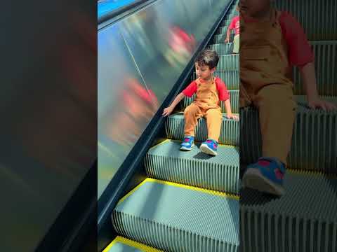 Cute baby sitting on #escalator😂😍