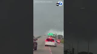 Tornado passes over highway in Fort Pierce, Florida