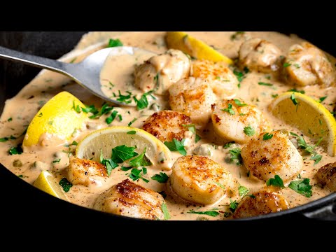 The secrets to the PERFECT pan fried scallops in a rich creamy garlic white wine sauce!