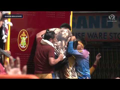 Image of Jesus Nazareno passes through Quezon Boulevard