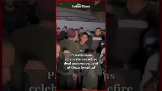 Palestinians celebrate ceasefire deal announcement at Gaza hospital