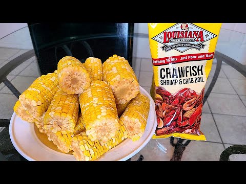 New Orleans Style boiled corn | Fresh corn cobs simmered in a highly seasoned liquid and soaked.