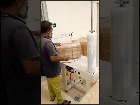 Box stretch wrapping machine