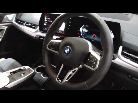 BMW iX2 xDrive30 M Sport 2023-2024 From the driver's seat to the back seat